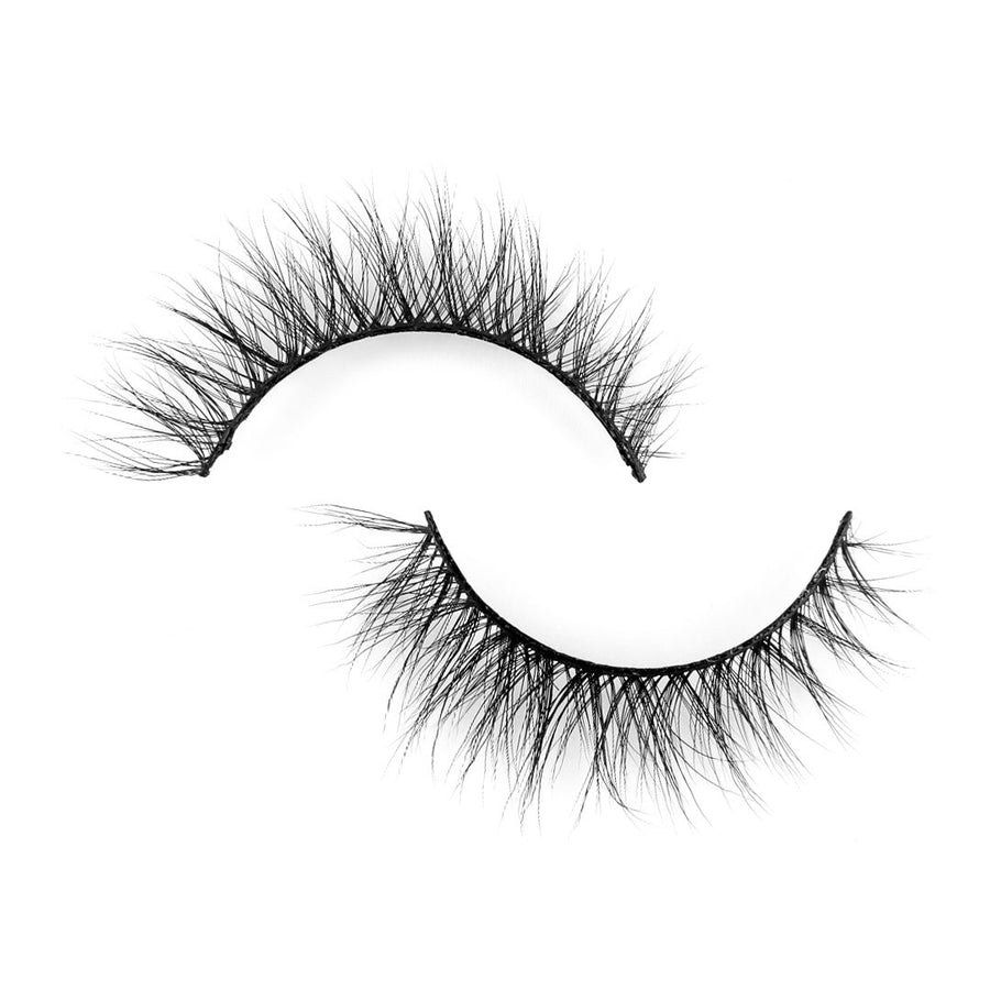 F-101 Suntarah Beauty 3D Faux Mink False Strip Lash Lying Flat Against White Backdrop.  Natural and Wispy Lash with Strong Flexible Black Band