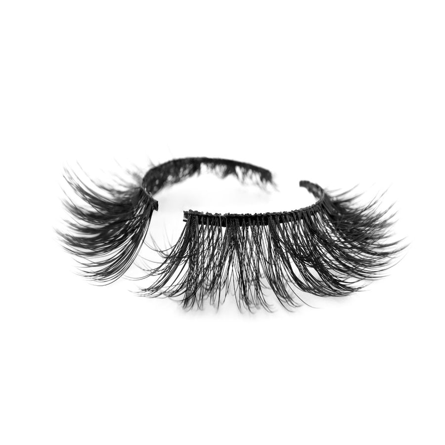 Suntarah Beauty 3D Premium Synthetic false strip lash in style S-224. Lash has medium volume, a tapered shape, and a black band. It is shown at angle against a white backdrop showing the slight curl of lash fibres.