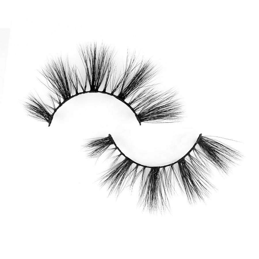 Suntarah Beauty 3D Faux Mink False Strip Eyelash in Style F-103 flat against a white backdrop.  Lash has dynamic light and medium volume clusters,  and a black band.