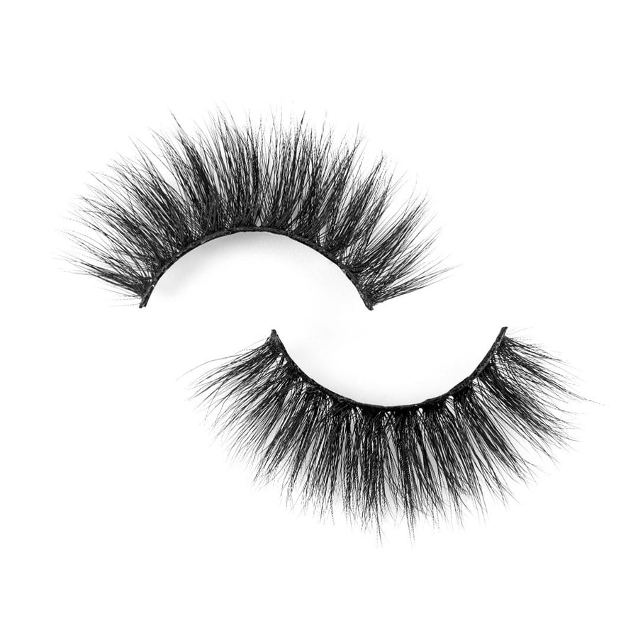 Suntarah Beauty Faux Mink False Strip Eyelash in style F104 with black band, round shape, and medium volume.  Lash is flat against a white backdrop.