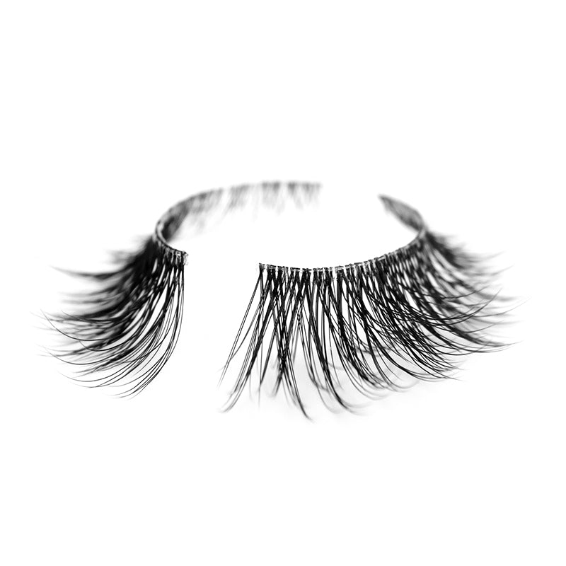 Suntarah Beauty 3D Ultra Light Synthetic false strip lash in style SL-332.  Lash has natural everyday volume, a very tapered shape, and a thin clear band. It is shown at angle against a white backdrop showing the beautiful  subtle curl of lash fibres.