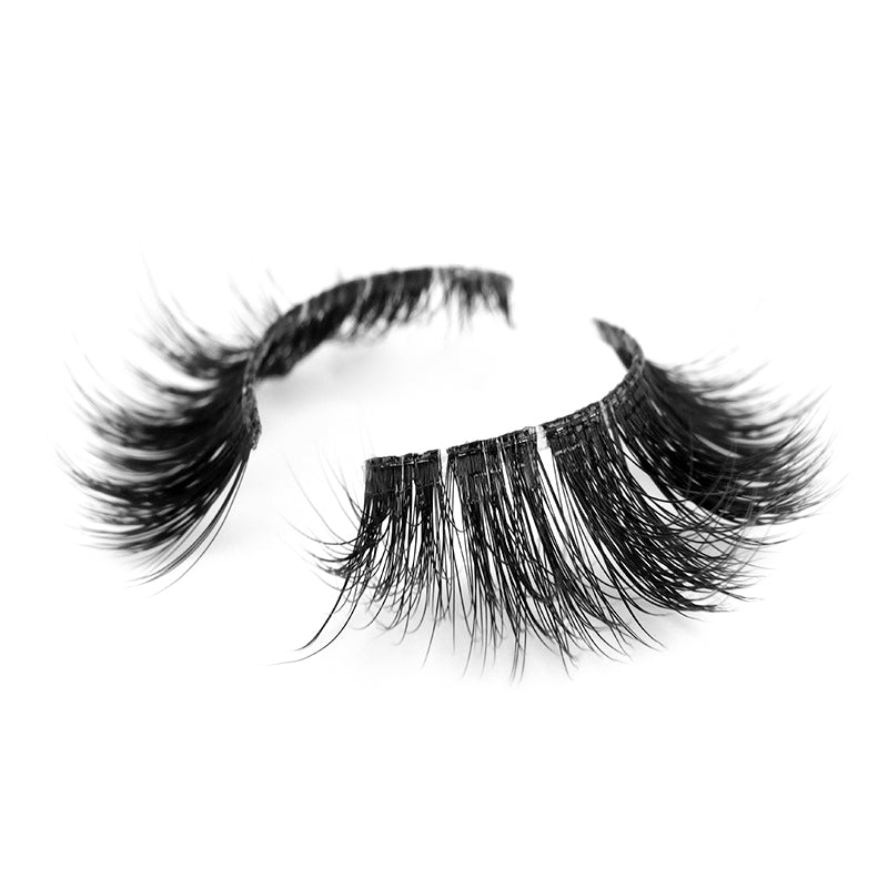 Suntarah Beauty 3D Ultra Light Synthetic false strip lash in style SL-333.  Lash has medium volume, a round shape, and a short thin clear band. It is shown at angle against a white backdrop showing the beautiful curl of lash fibres.